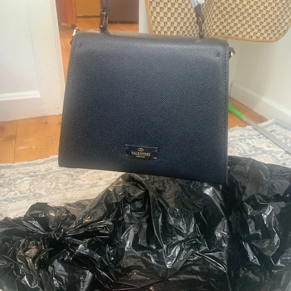 Elegant Black Satchel with Silver Logo - Picture 2 of 14